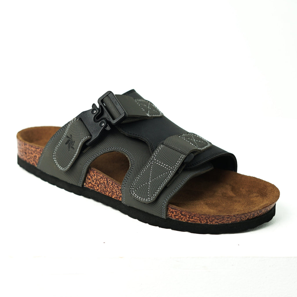 Gray sandal with a brown sole on a white background