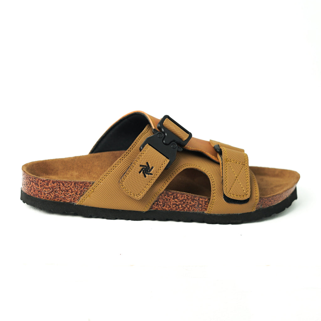 Brown sandal with a black strap on a white background